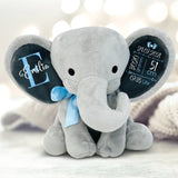 grauer Kuschelelefant mit blauer Scheife zur Geburt mit Namen und Geburtsdaten vom Baby personalisiert mit Love & Faith