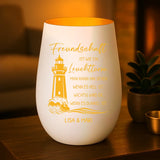 Graviertes Freundschafts-Windlicht weiß-gold mit Leuchtturm und Namen von Love & Faith